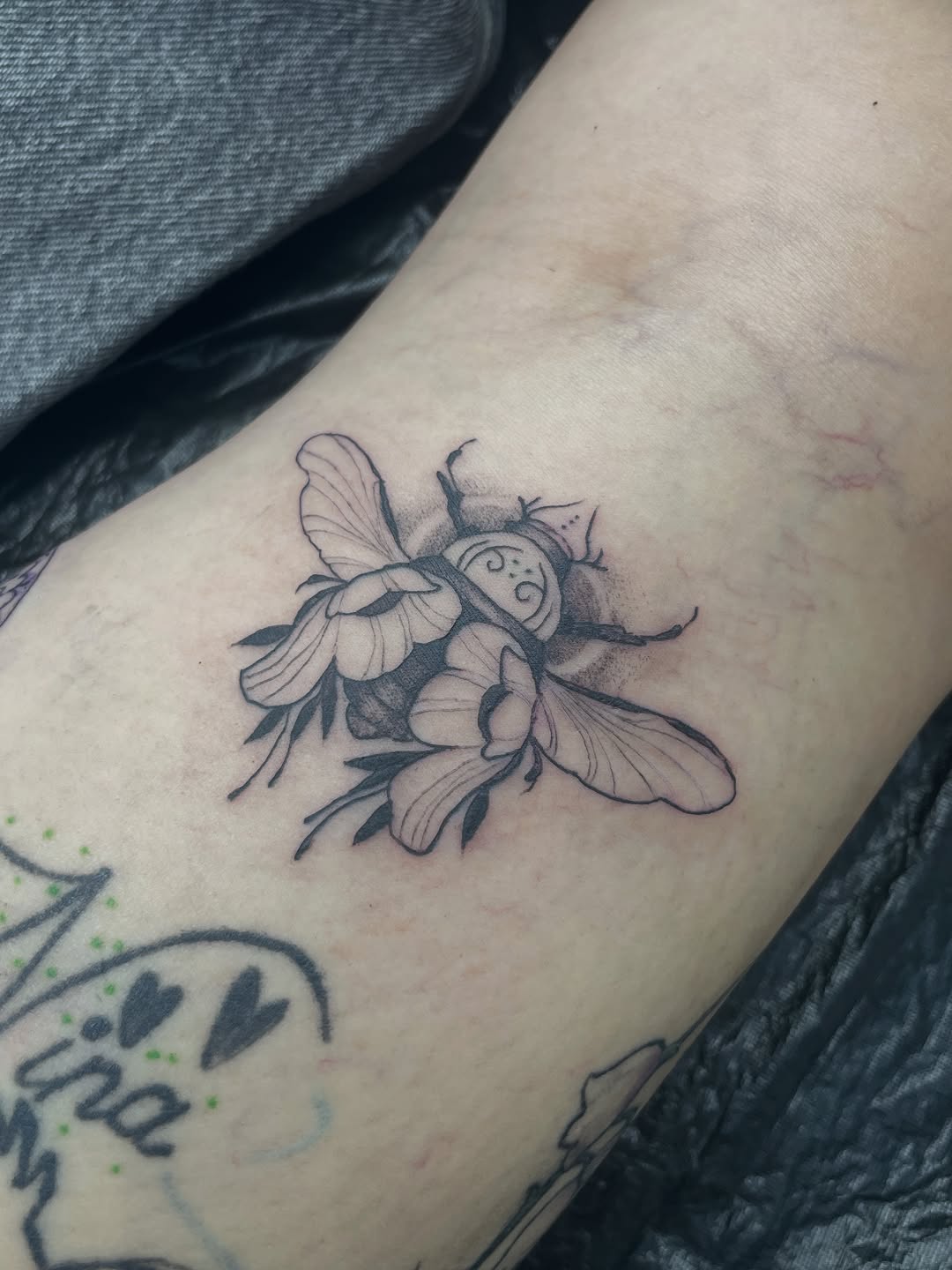 Tattoo by @amber_noir_tattoo โ fine_line, black_and_grey