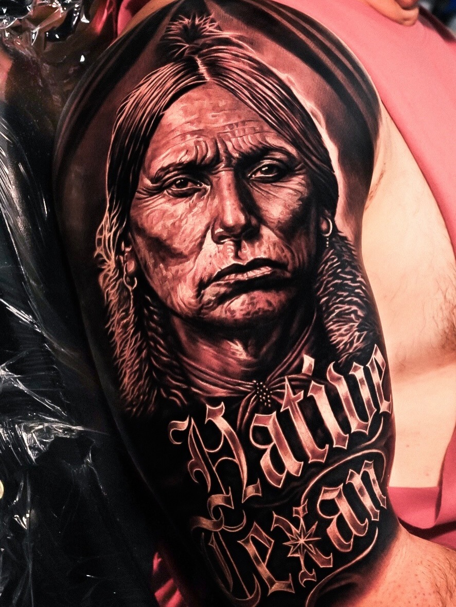 Tattoo by @lange_tattoo — realism, black_and_grey