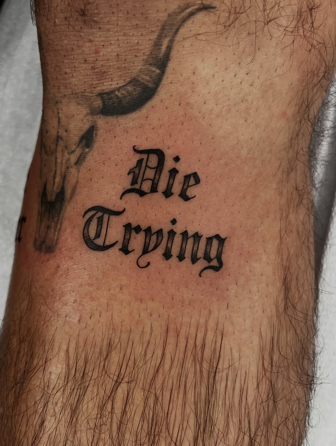 Tattoo by @dirty_funq — lettering_script, blackwork