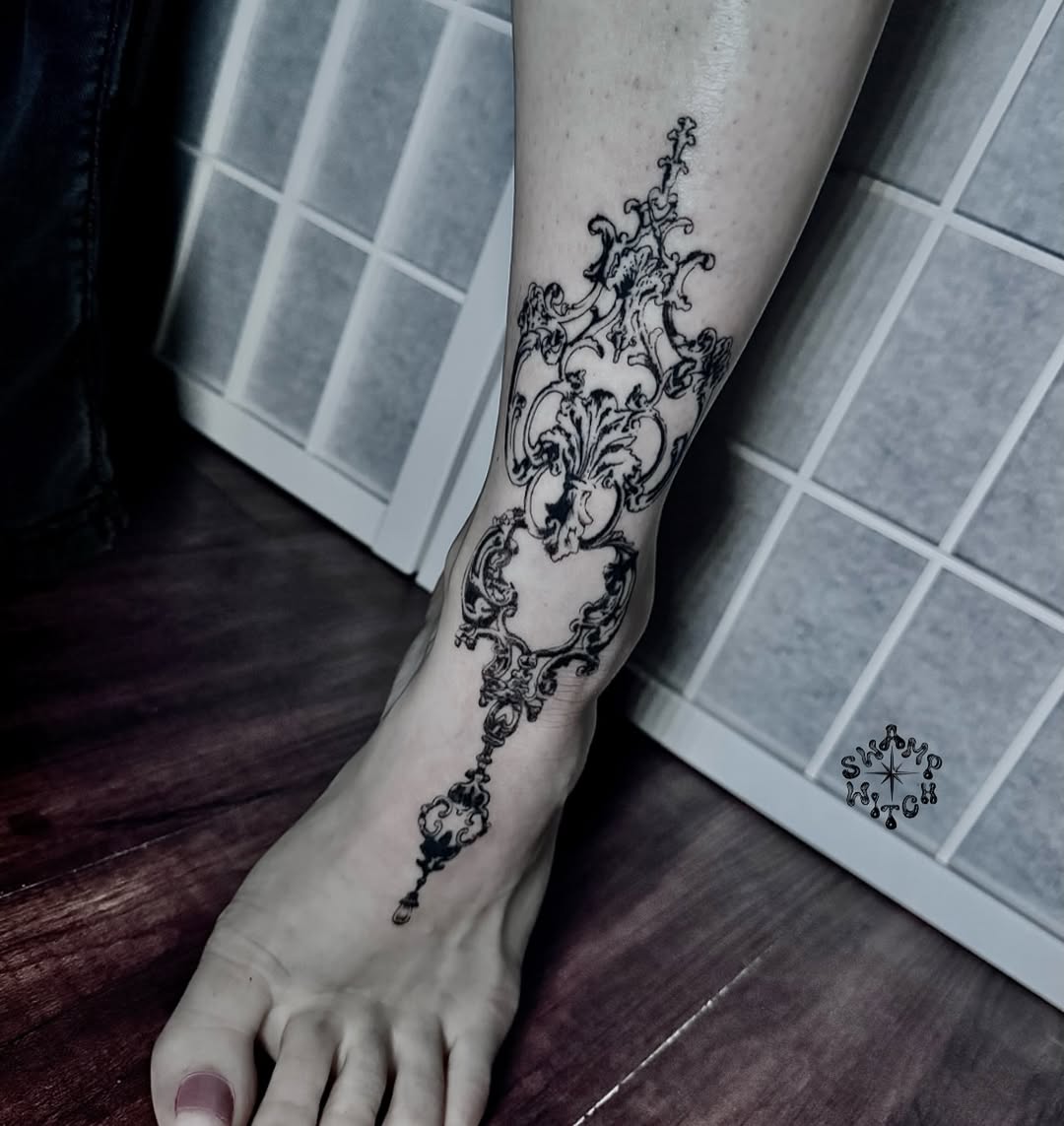 Tattoo by @swamp.witch.tattoos — ornamental, black_and_grey