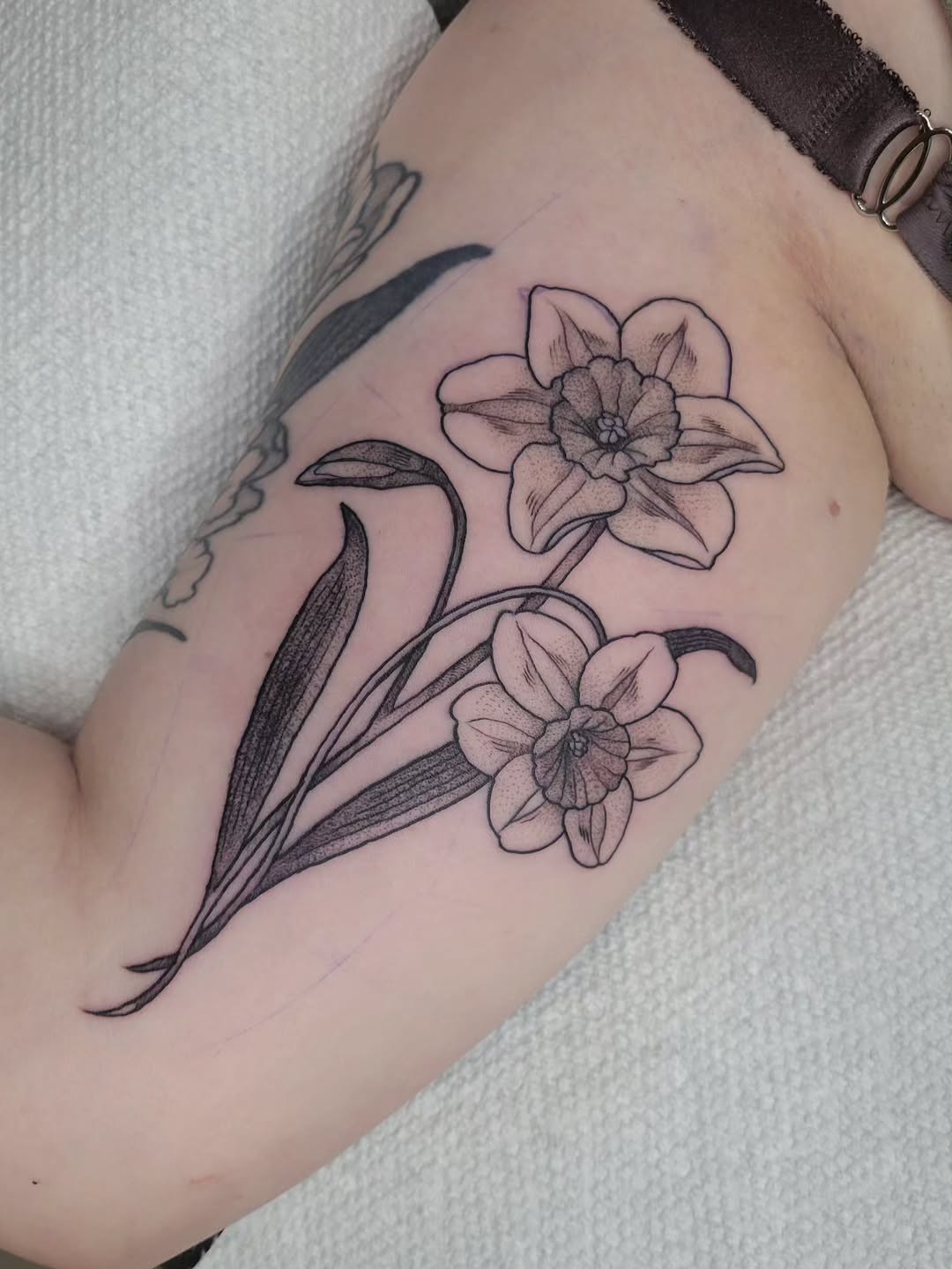 Tattoo by @melancholy.moth.tattoo — fine_line, black_and_grey