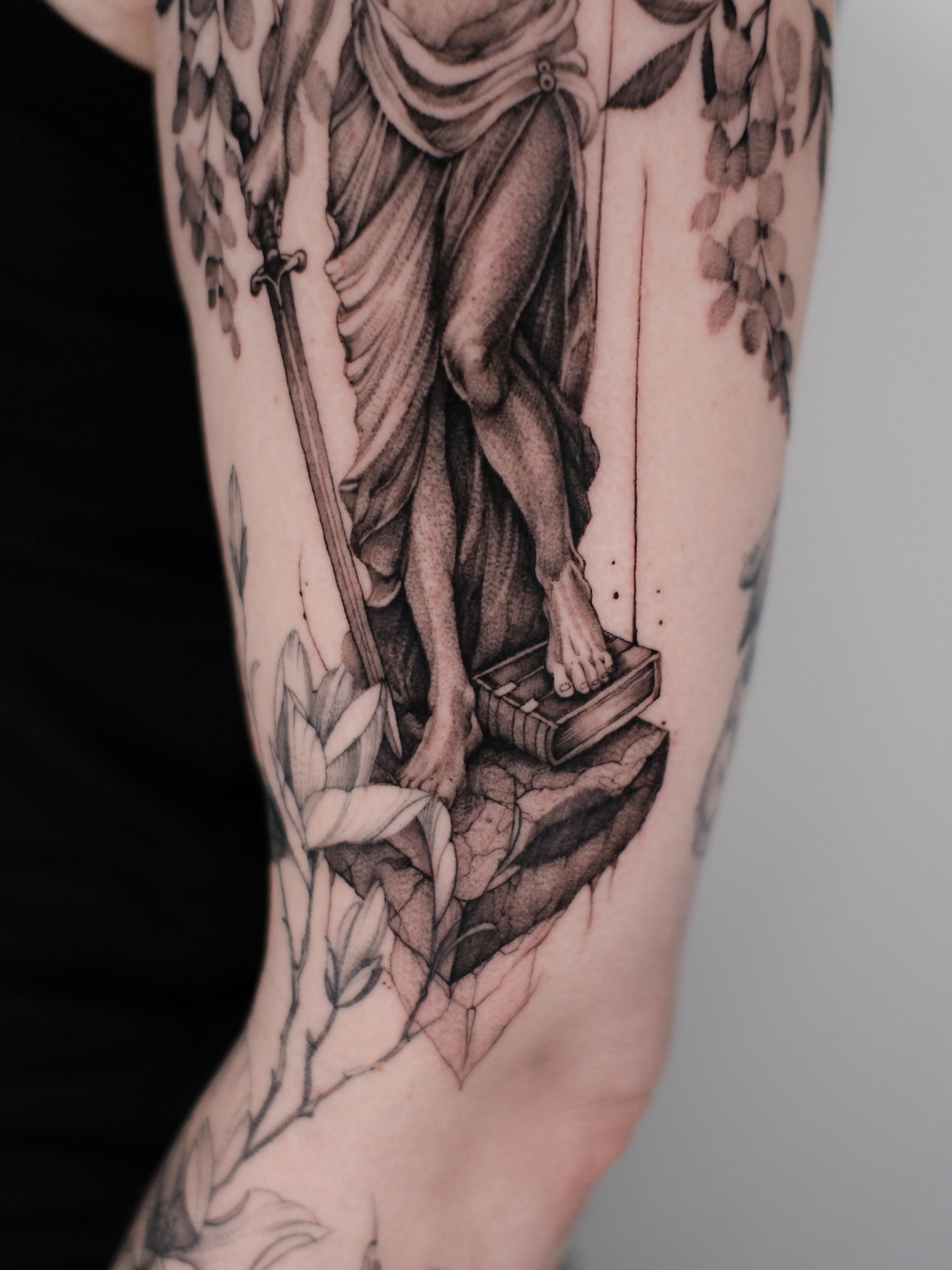 Tattoo by @tattoo.protsenko — realism, black_and_grey