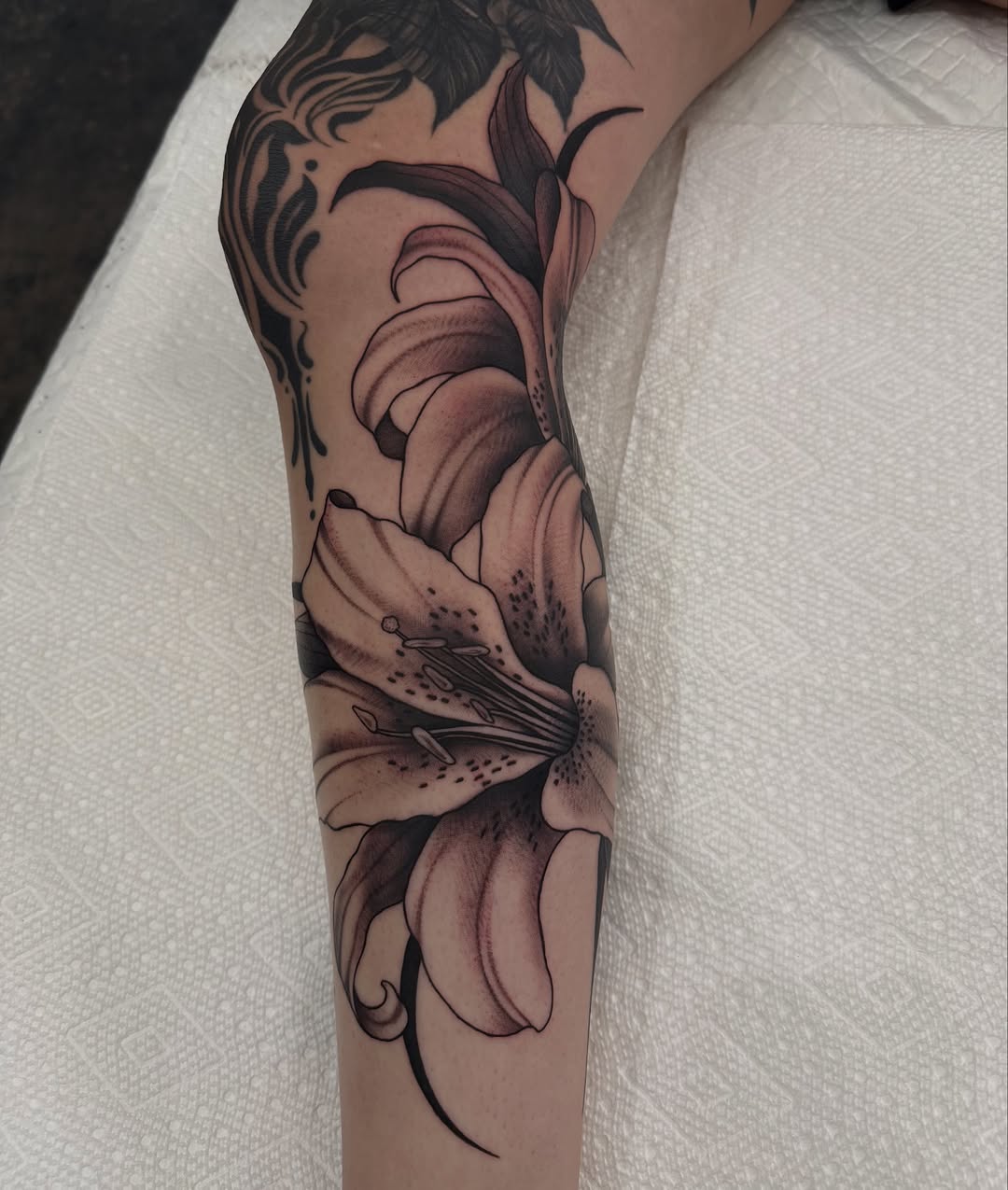 Tattoo by @lucidimprints_tattoo โ realism, black_and_grey