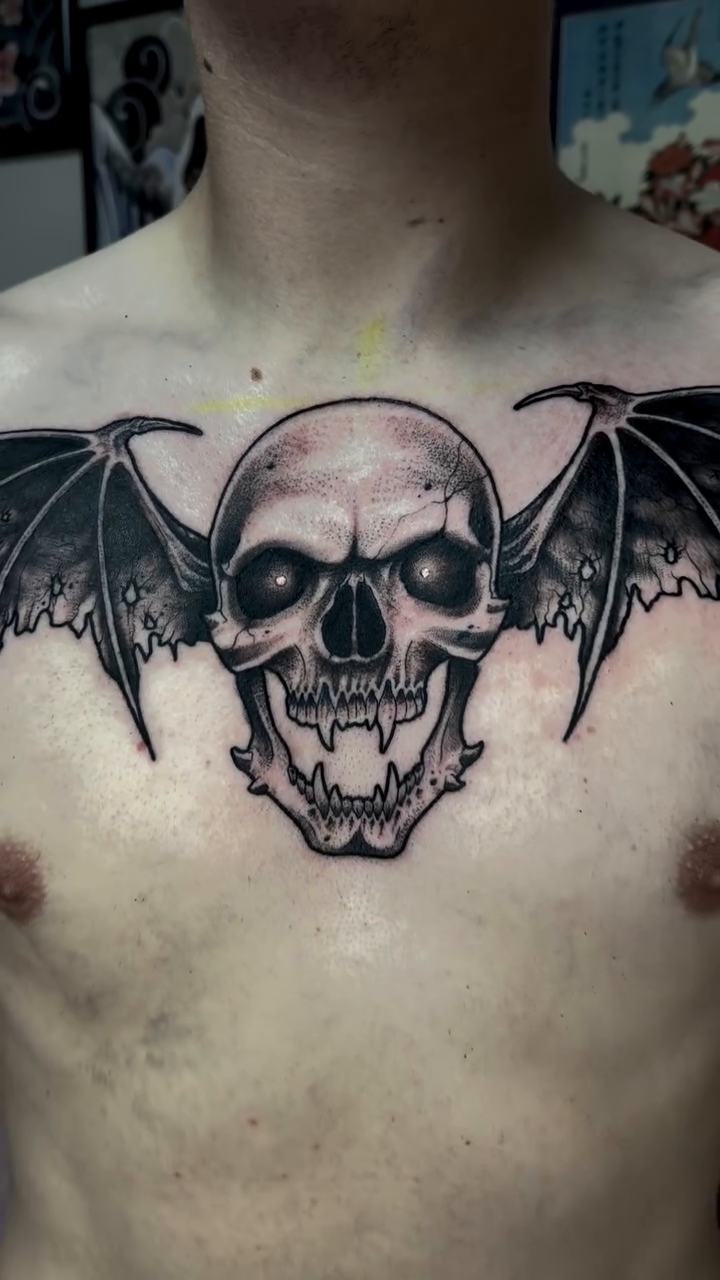 Tattoo by @katscratchtattooss — dark_realism, black_and_grey