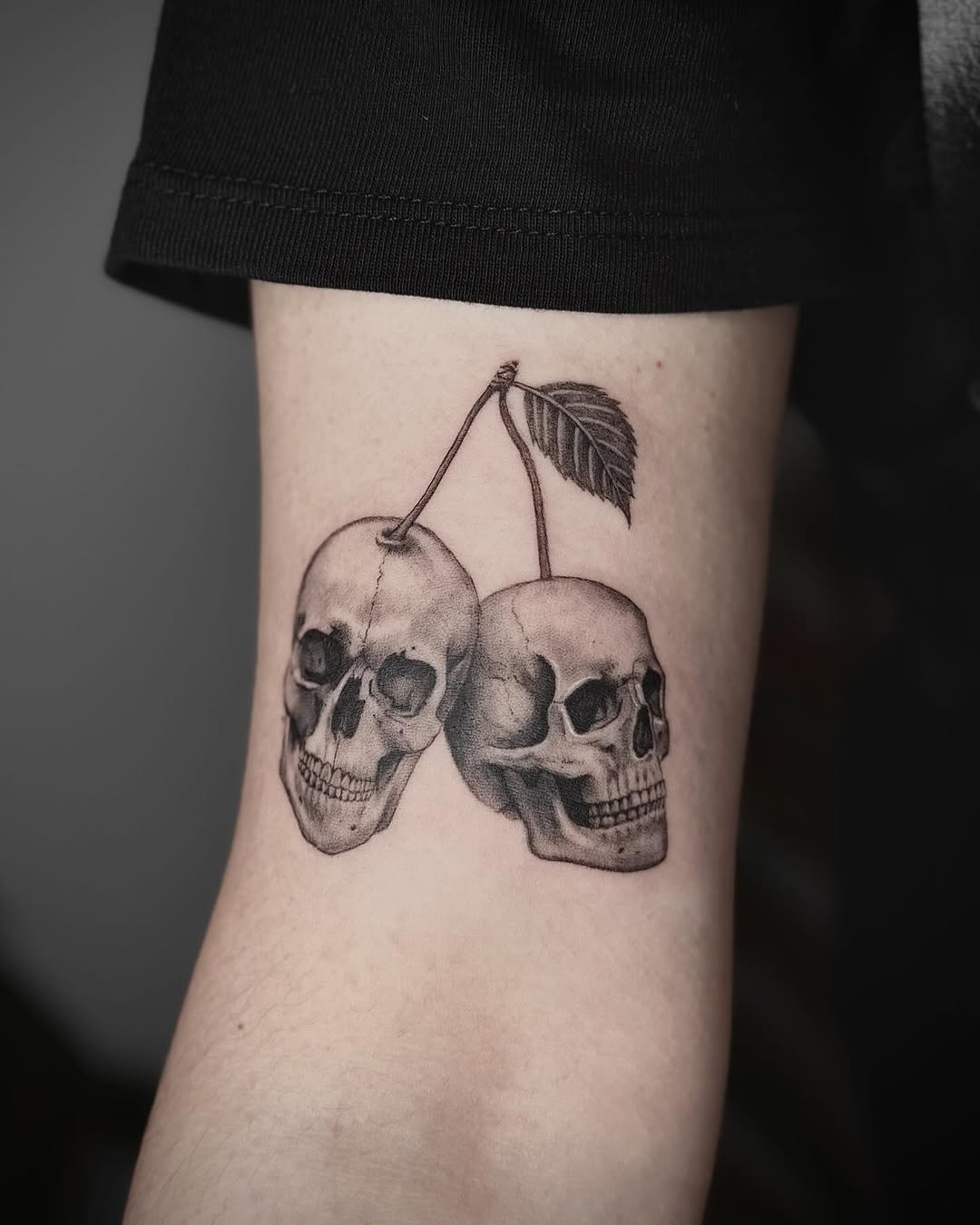 Tattoo by @janetatt.co — black_and_grey, realism