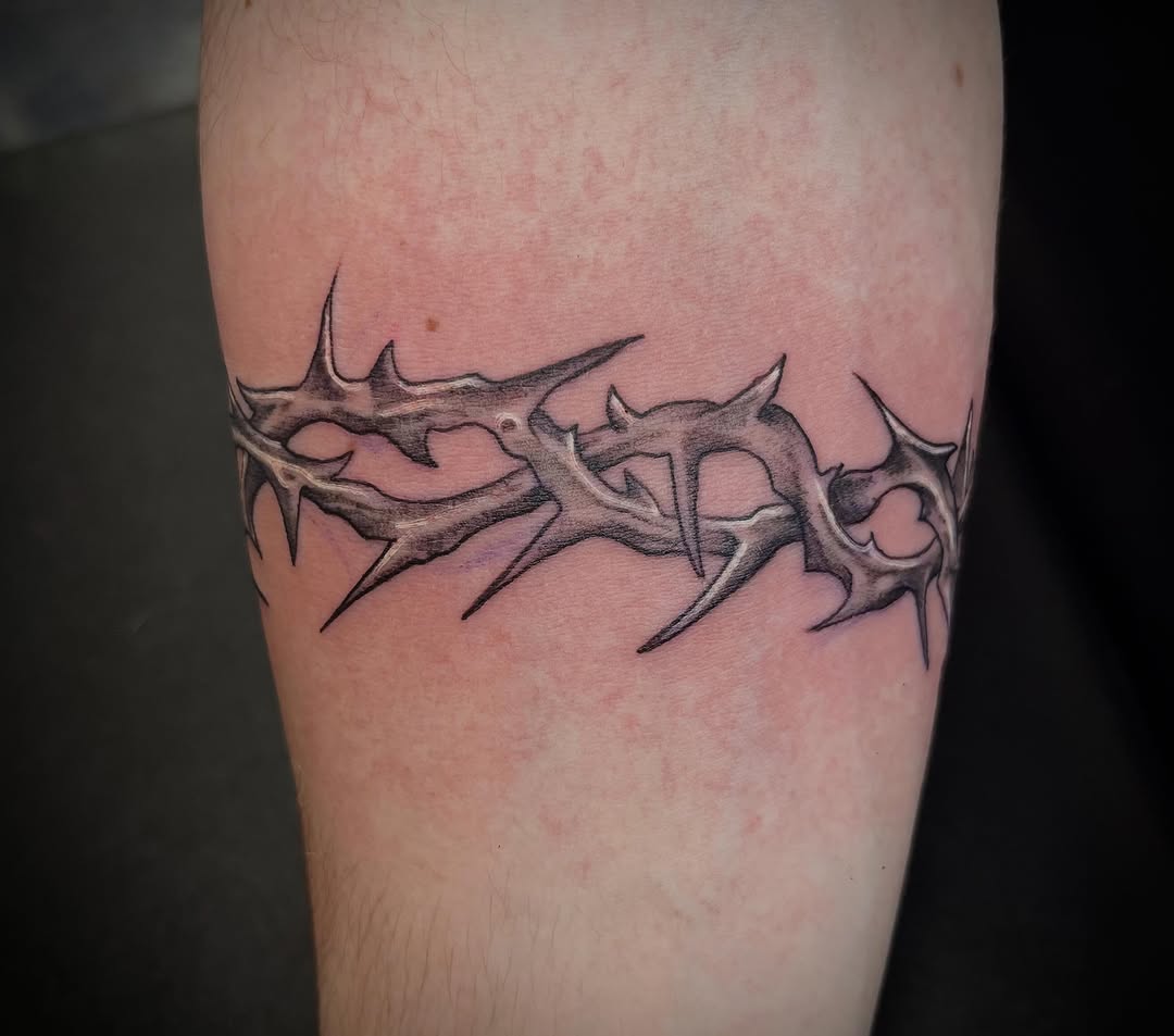 Tattoo by @necro_comicon — black_and_grey, realism