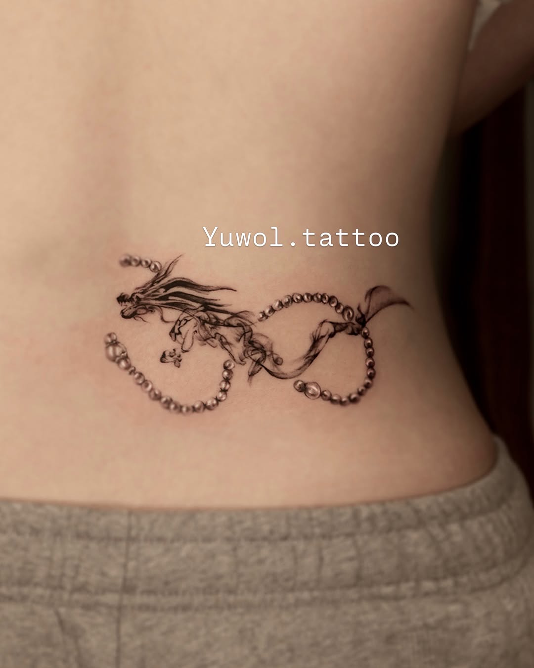 Tattoo by @yuwol.tattoo — fine_line, black_and_grey