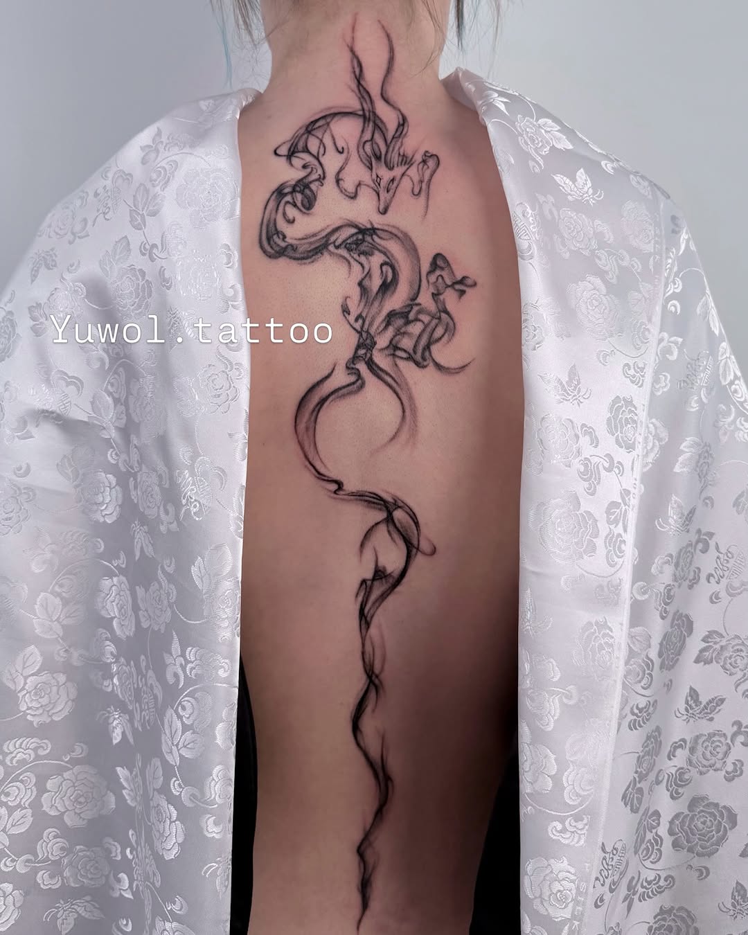 Tattoo by @yuwol.tattoo — black_and_grey, fine_line