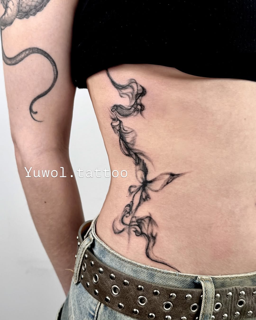 Tattoo by @yuwol.tattoo — black_and_grey, dotwork
