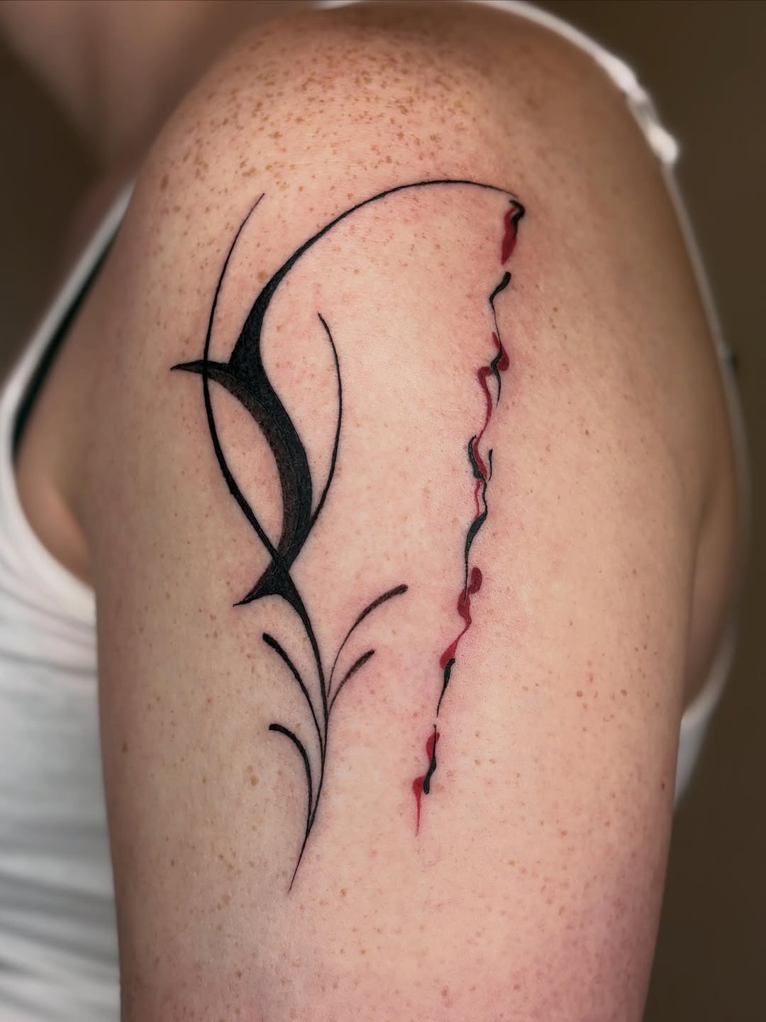Tattoo by @soupytats — illustrative, blackwork