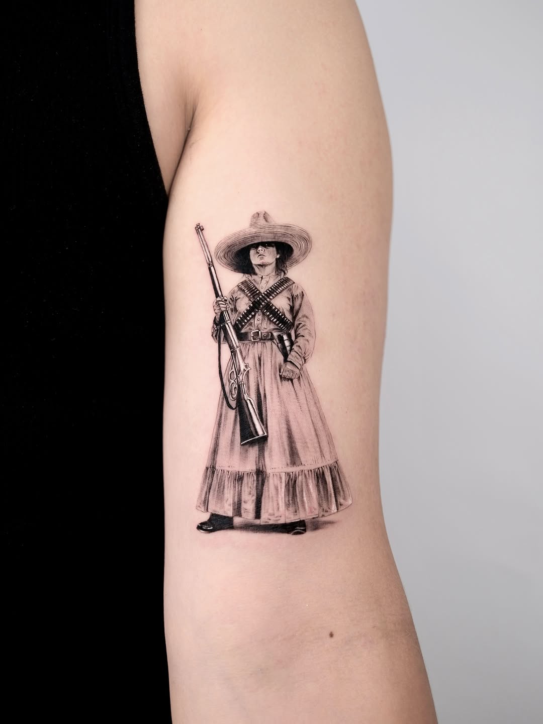 Tattoo by @tattooer.ari โ realism, black_and_grey