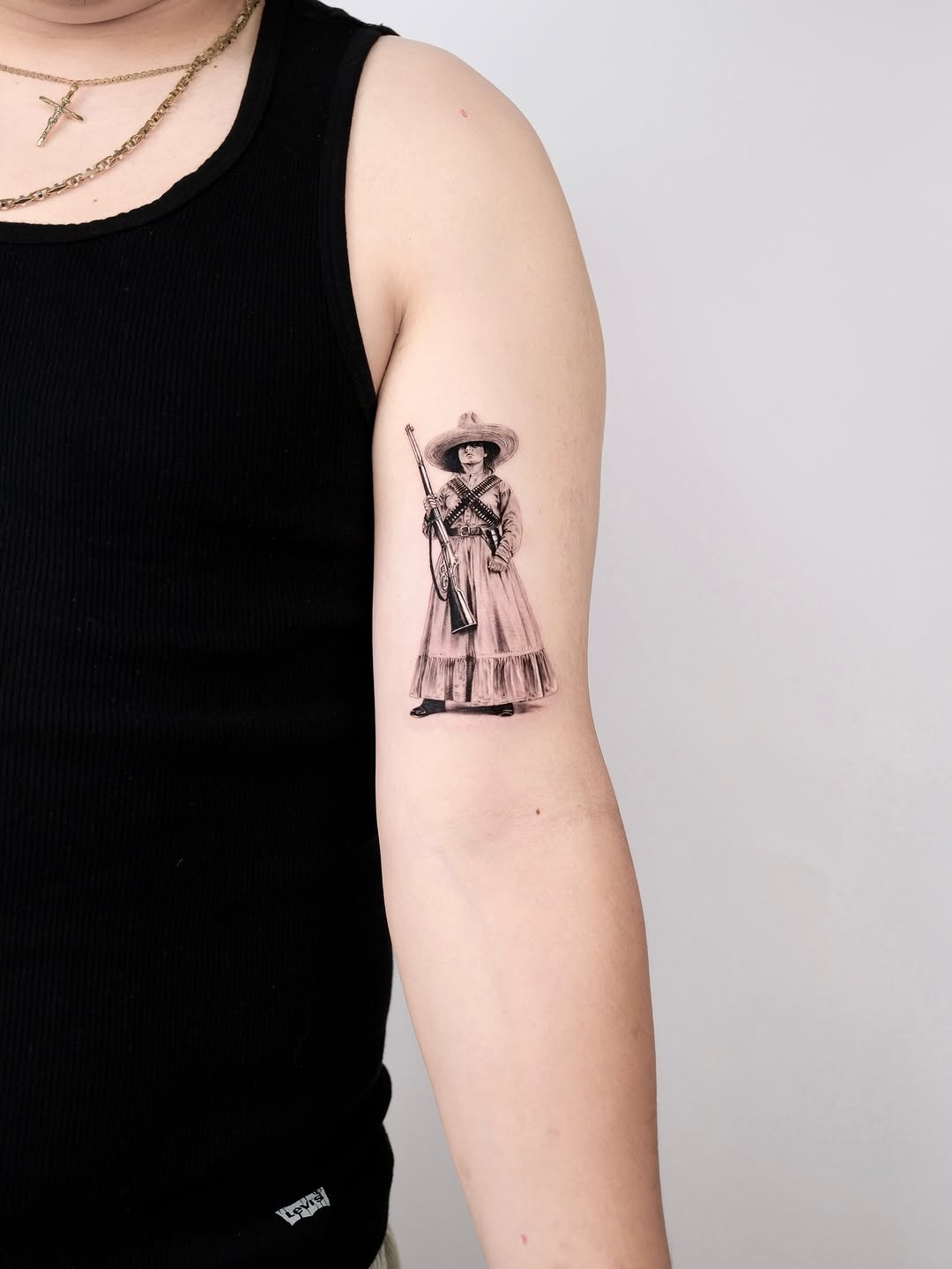 Tattoo by @tattooer.ari โ realism, black_and_grey