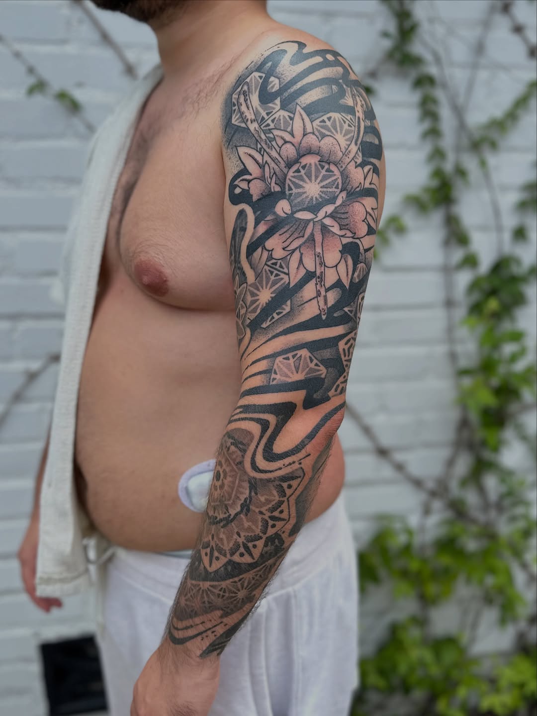 Tattoo by @jon.miller.tattoo — black_and_grey, geometric