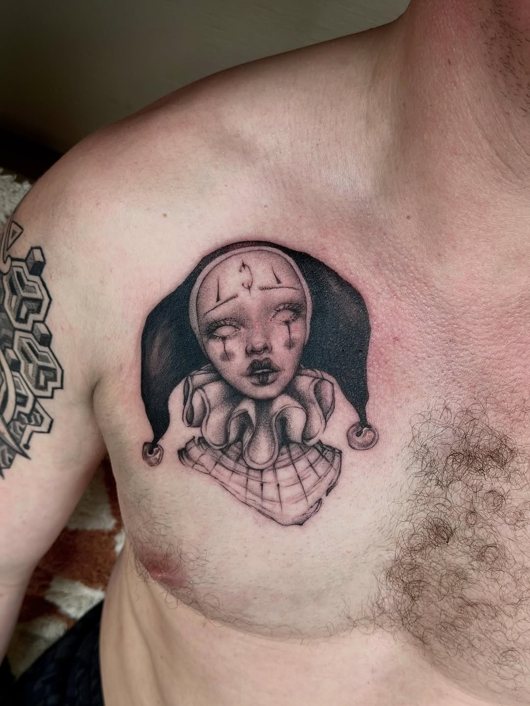 Tattoo by @er.ink.a — dark_realism, black_and_grey
