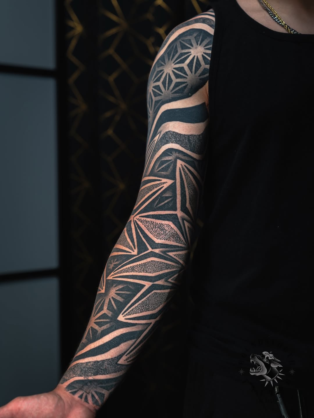 Tattoo by @sacredhound.ttt — geometric, dotwork