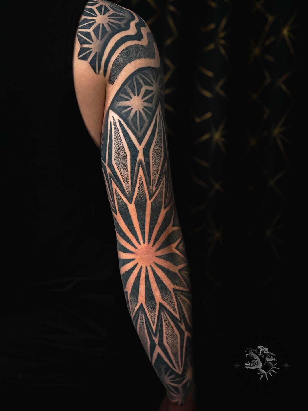Tattoo by @sacredhound.ttt — geometric, dotwork