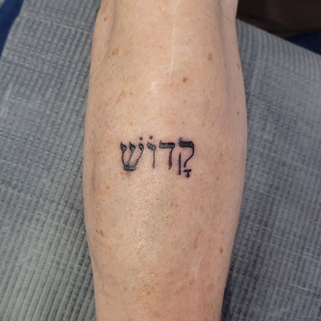 Tattoo by @sarah_tone_ink — lettering_script, fine_line