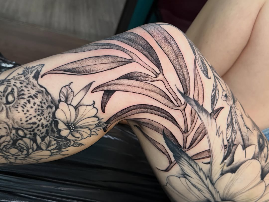Tattoo by @inkedby_adam — black_and_grey, illustrative