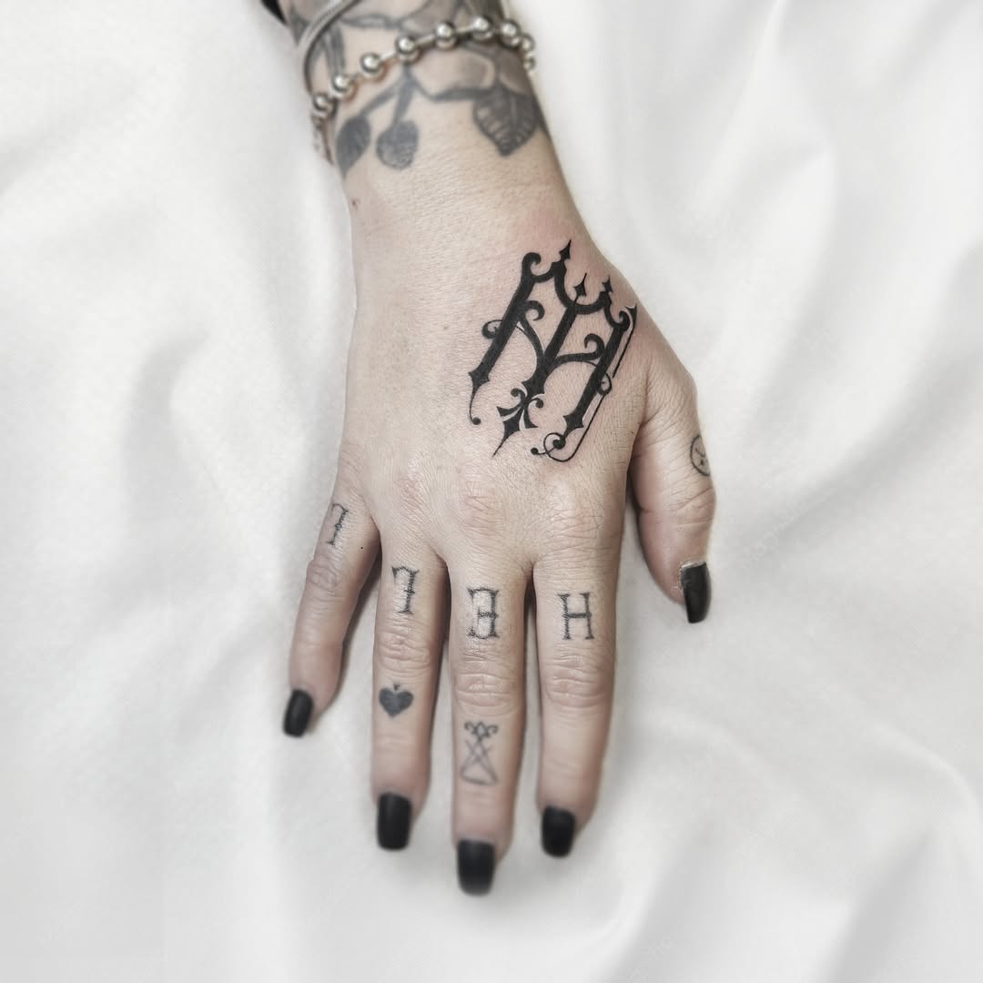 Tattoo by @inkart_ari — lettering_script, blackwork