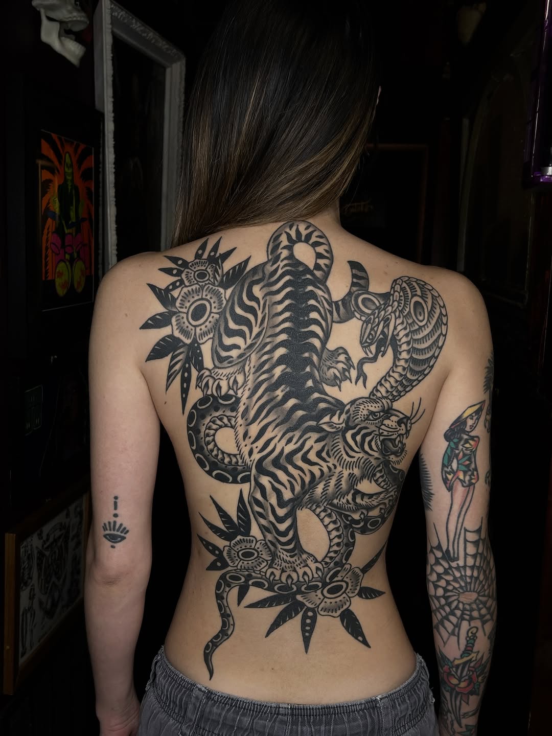 Tattoo by @hollydanesi โ american_traditional, blackwork