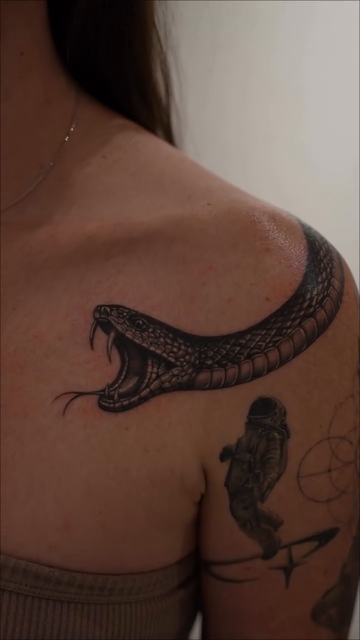 Tattoo by @rcw.ink — black_and_grey, realism