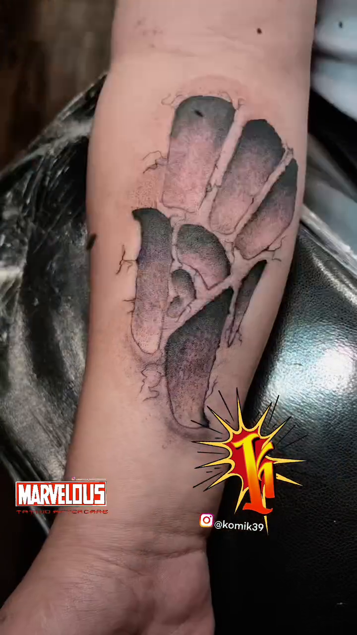 Tattoo by @komik39 — black_and_grey, realism