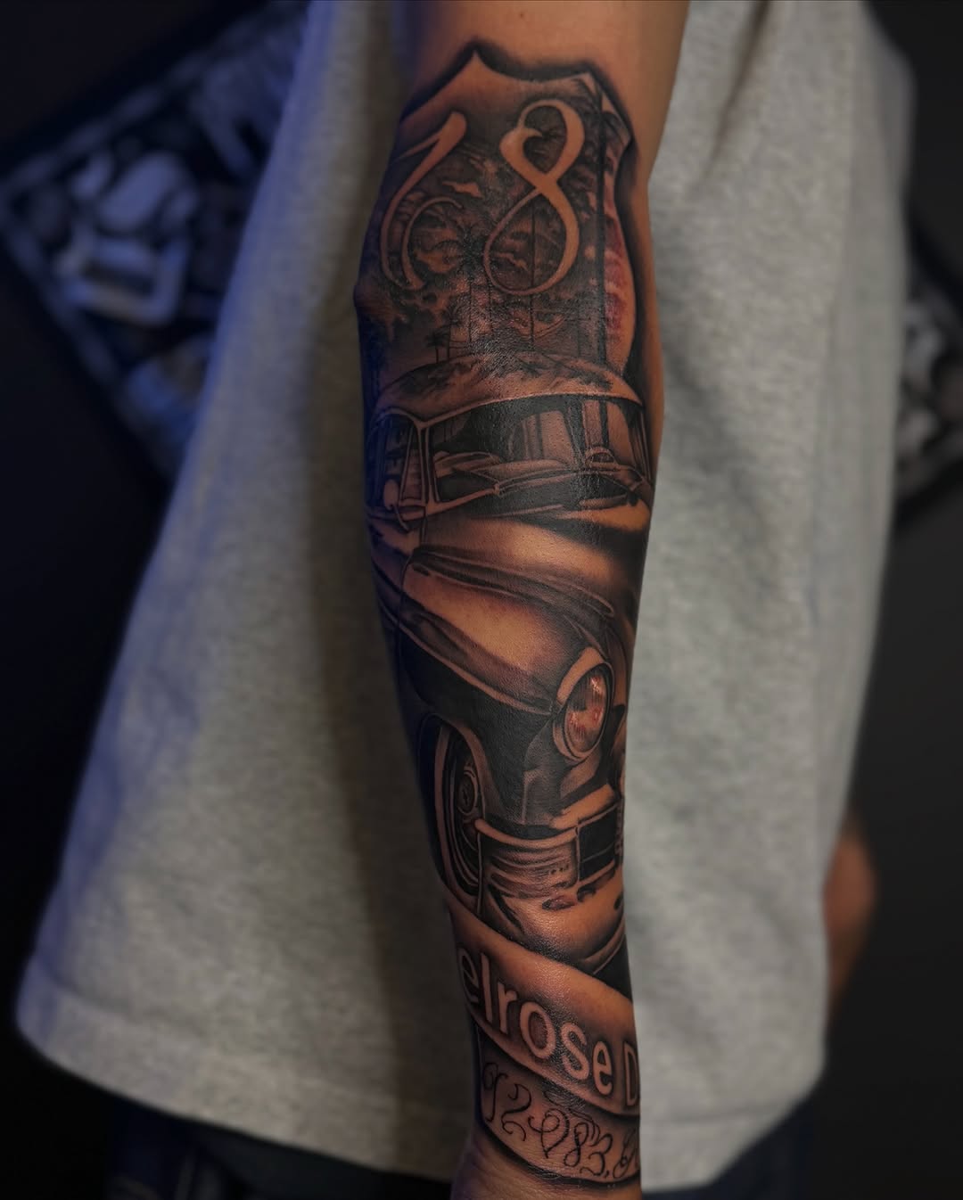 Tattoo by @dropletz619 — black_and_grey, realism