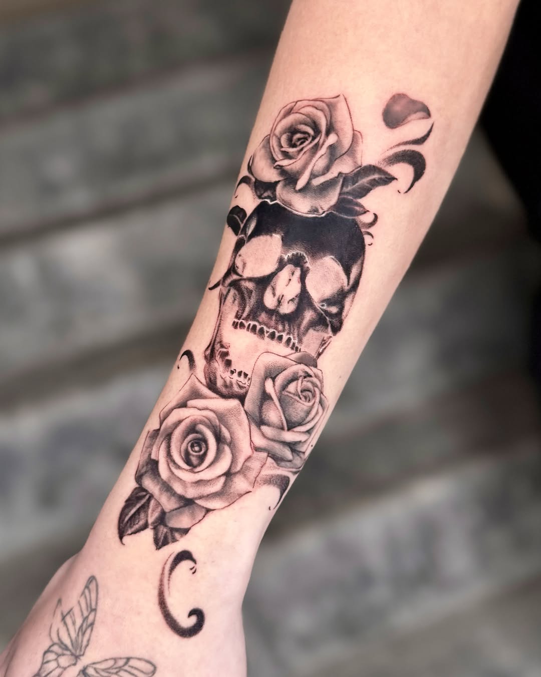 Tattoo by @eblu.ink — realism, black_and_grey
