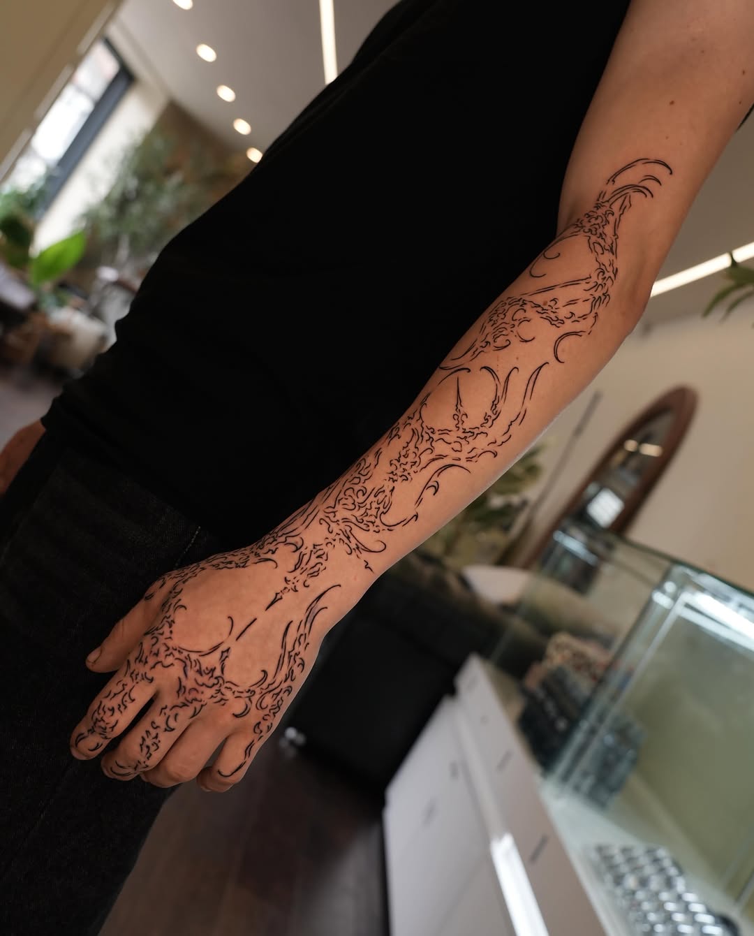 Tattoo by @rtrv.tattoo — blackwork, ornamental