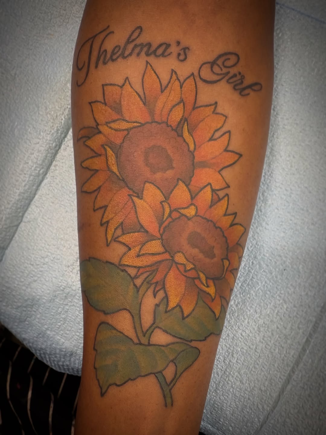 Tattoo by @tyyger.style — illustrative, lettering_script