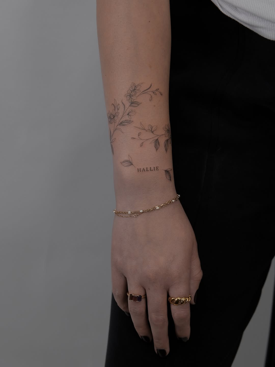 Tattoo by @naughty_rabbit_tattoo — fine_line, lettering_script