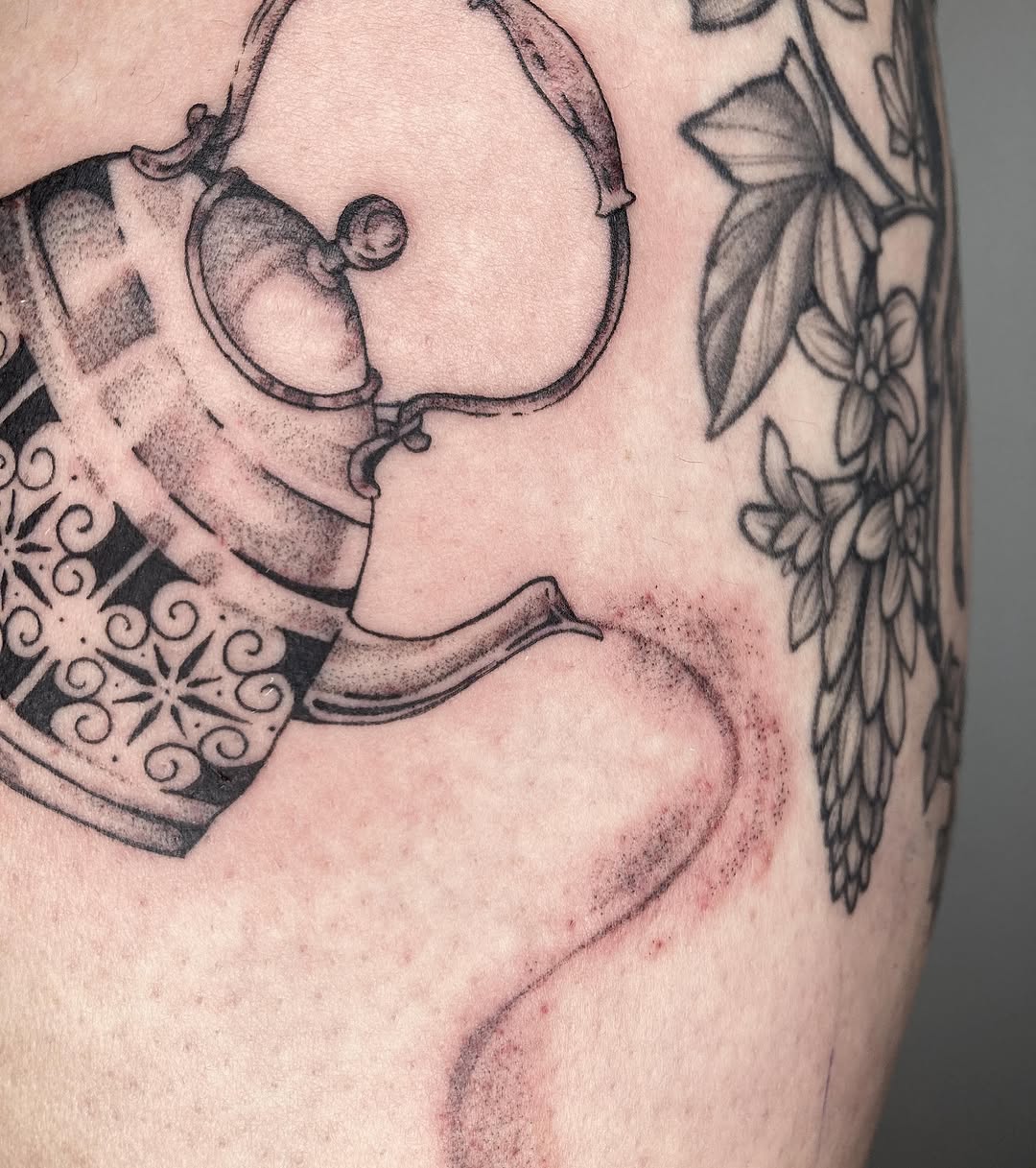 Tattoo by @lemon.inkade — illustrative, dotwork