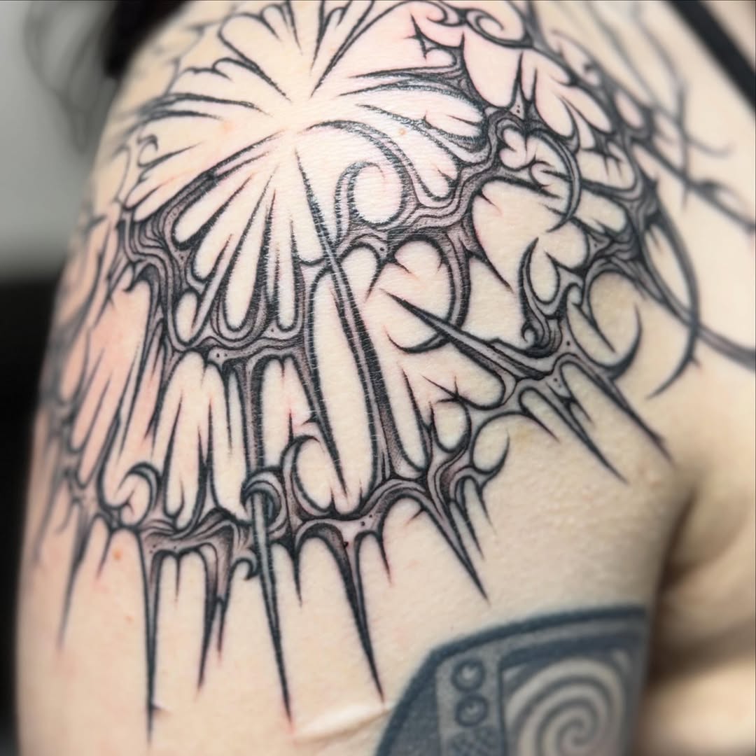Tattoo by @justina.tattoos — blackwork, ornamental