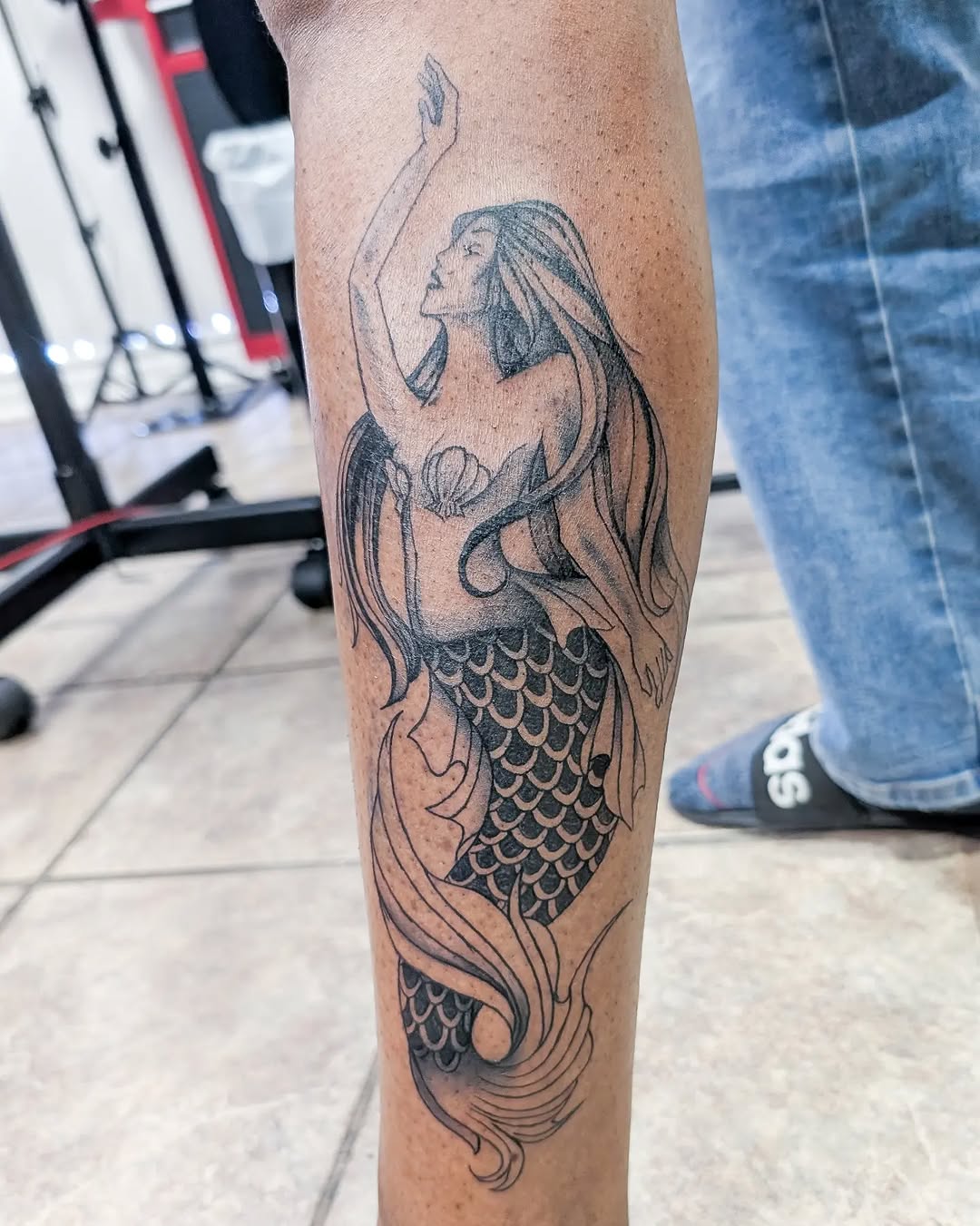 Tattoo by @poked.protein — black_and_grey, realism
