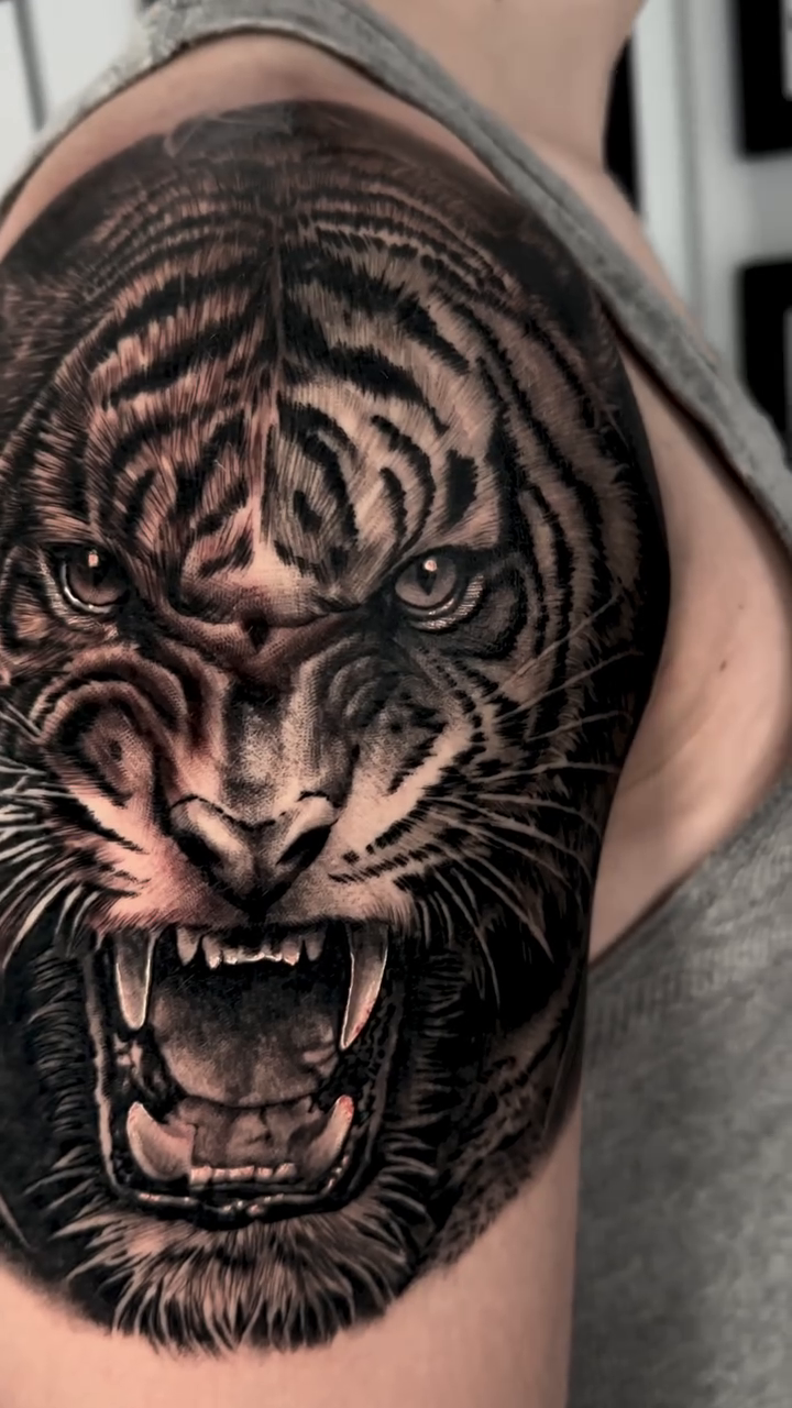 Tattoo by @weaver214 — realism, black_and_grey