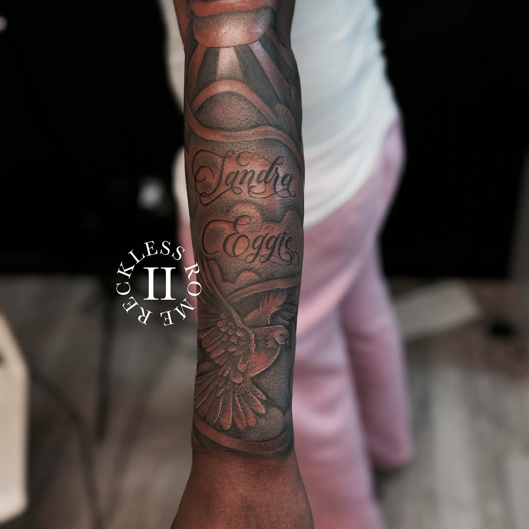 Tattoo by @2reckless__rome — lettering_script, black_and_grey