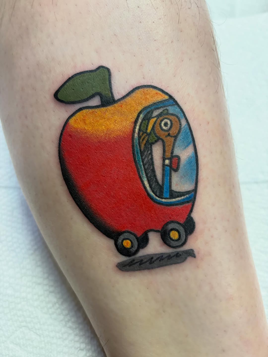 Tattoo by @kandarian.kola — illustrative, new_school