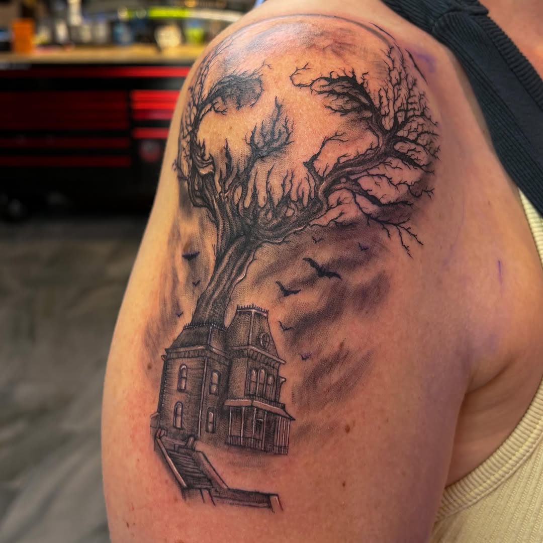 Tattoo by @nikkia.tattoo — dark_realism, black_and_grey