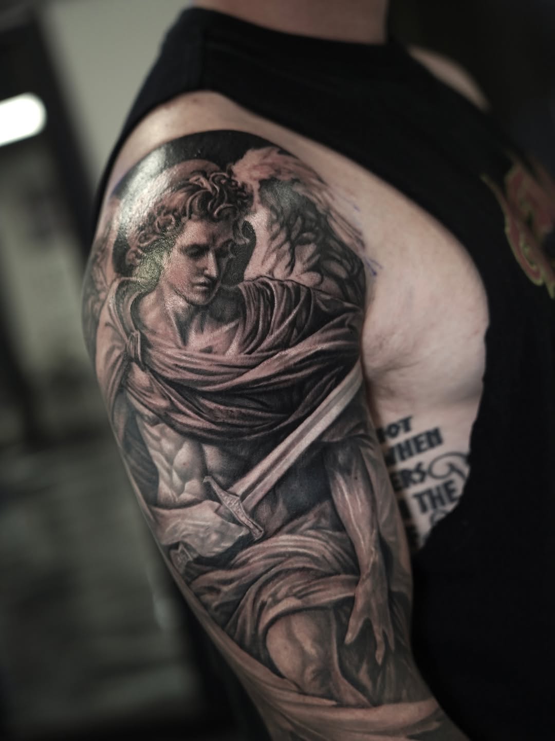 Tattoo by @nelsontellezart — realism, black_and_grey