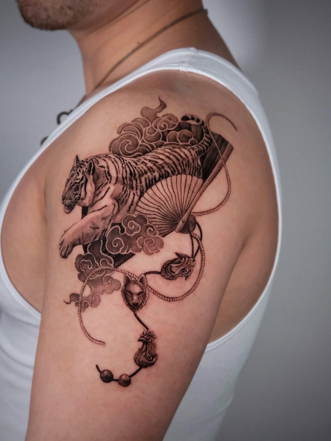 Tattoo by @da.an_tattooer — realism, black_and_grey