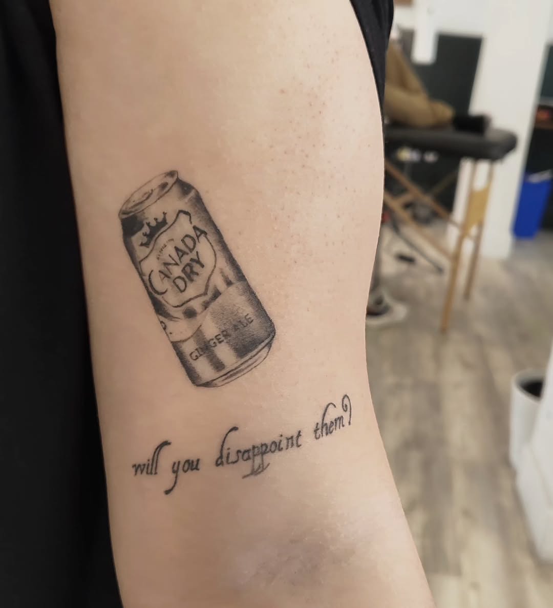 Tattoo by @m3ga.p1xlz — realism, lettering_script