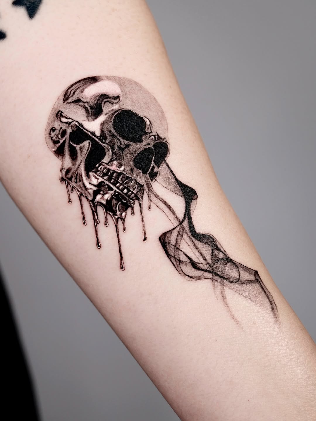 Tattoo by @tattooer.ari โ black_and_grey, illustrative