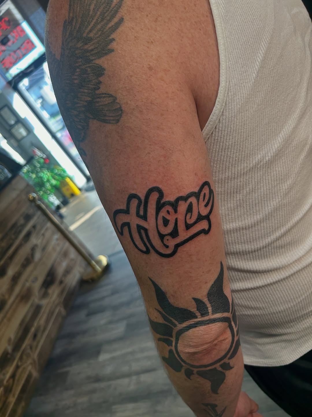 Tattoo by @noahsyer.tats — lettering_script