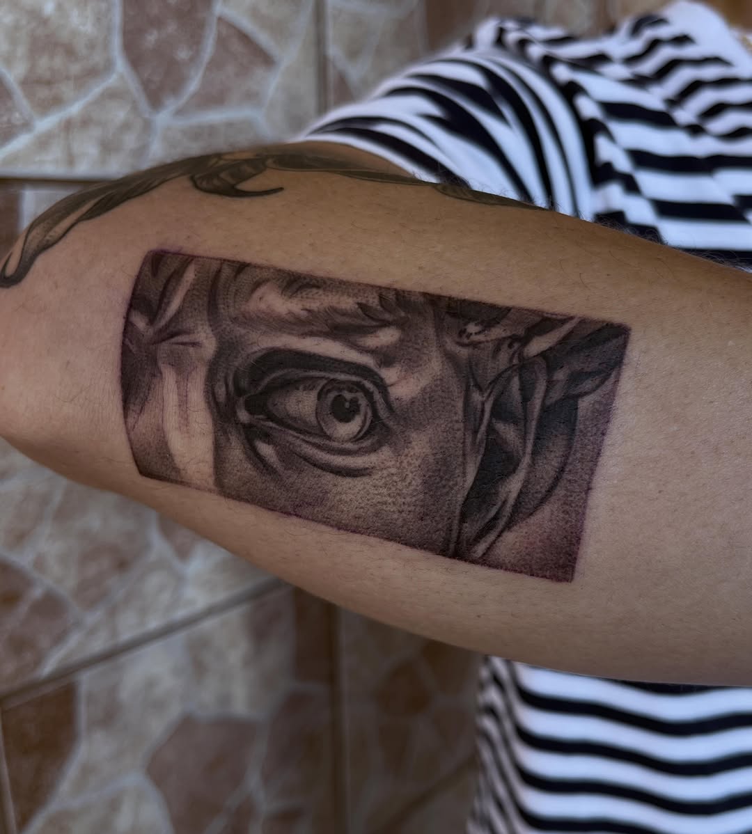 Tattoo by @cv__tattoo โ realism, black_and_grey