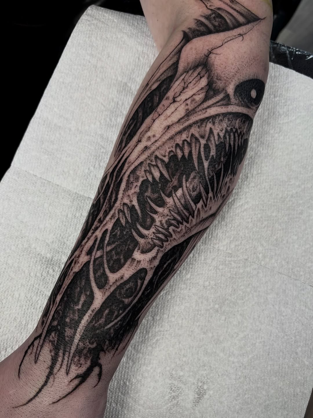 Tattoo by @corn.on.the.jacob — black_and_grey, dark_realism