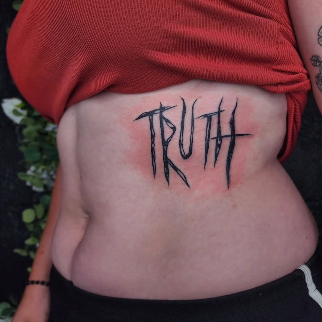 Tattoo by @bblackhoundd โ lettering_script, illustrative