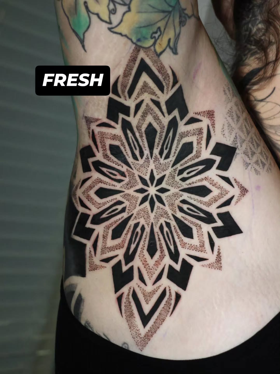 Tattoo by @stranger_tattooo — geometric, dotwork