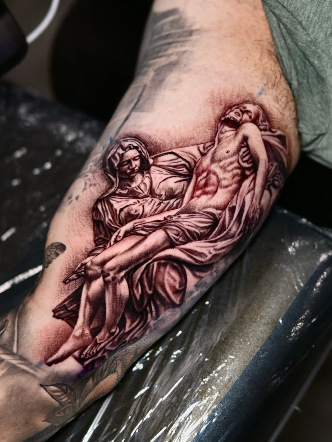 Tattoo by @blessed_ink23 β realism, black_and_grey