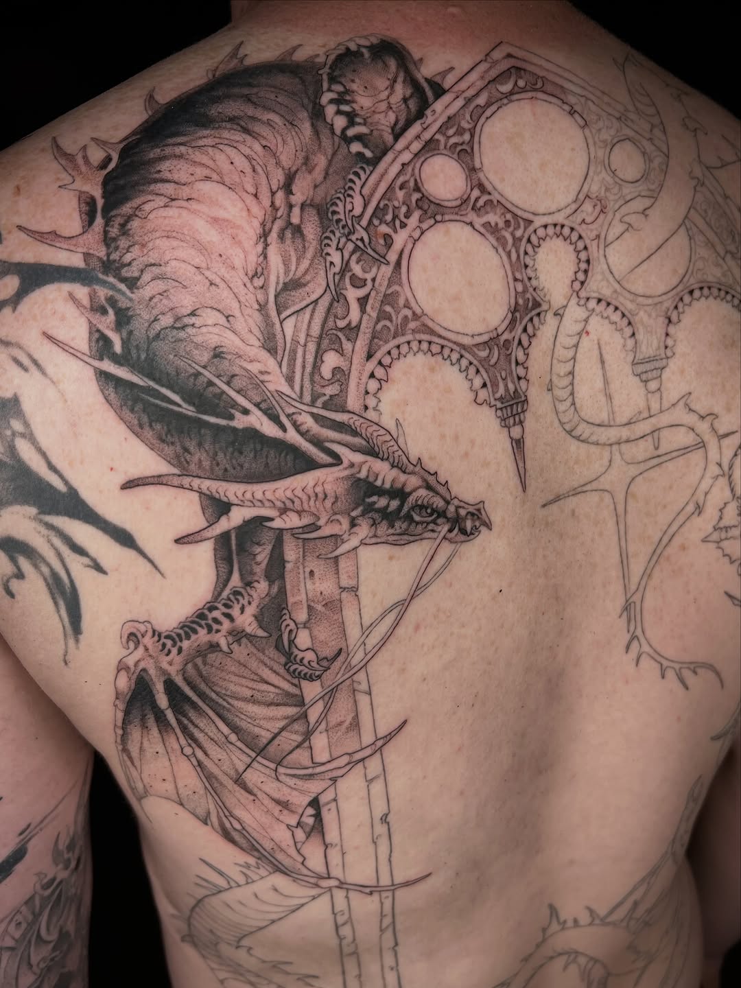 Tattoo by @revoltingworship — black_and_grey, realism