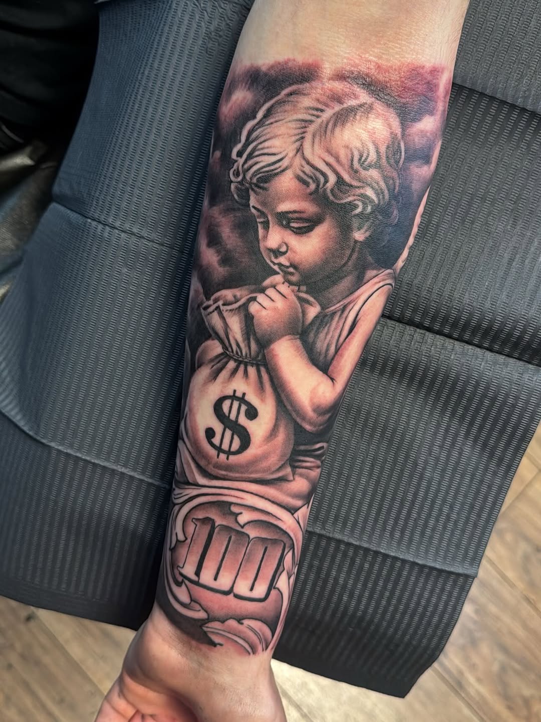 Tattoo by @crea8tive_director โ realism, black_and_grey